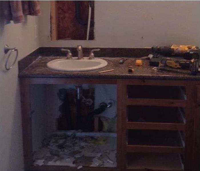 A kitchen damaged by water.